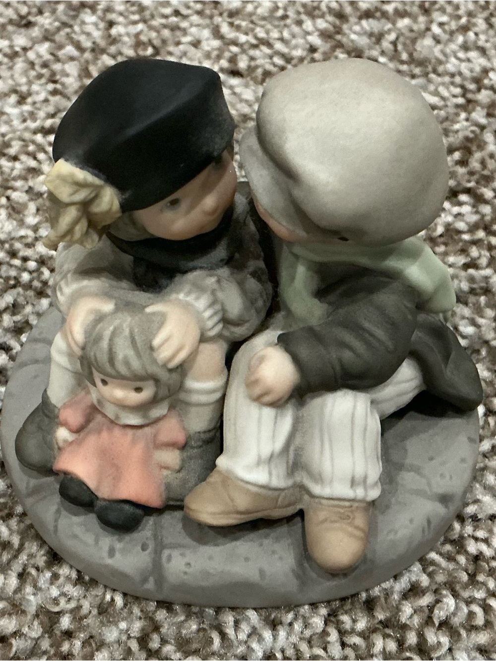Kim Anderson Figurine of Two Children with Doll - Pastel Tones